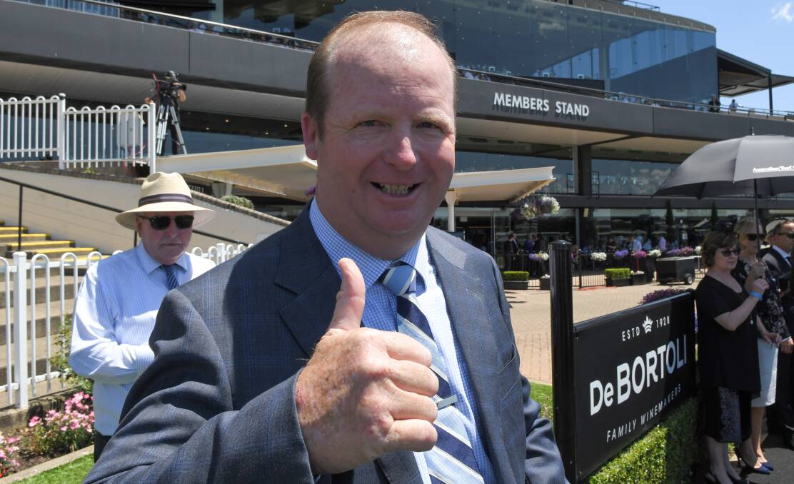 THUMBS UP: Former Orange trainer Gary Portelli after a win on Derby Day in Sydney, he'll be hoping his filly Showgals picks a victory up at Orange on Friday. Photo: AAP