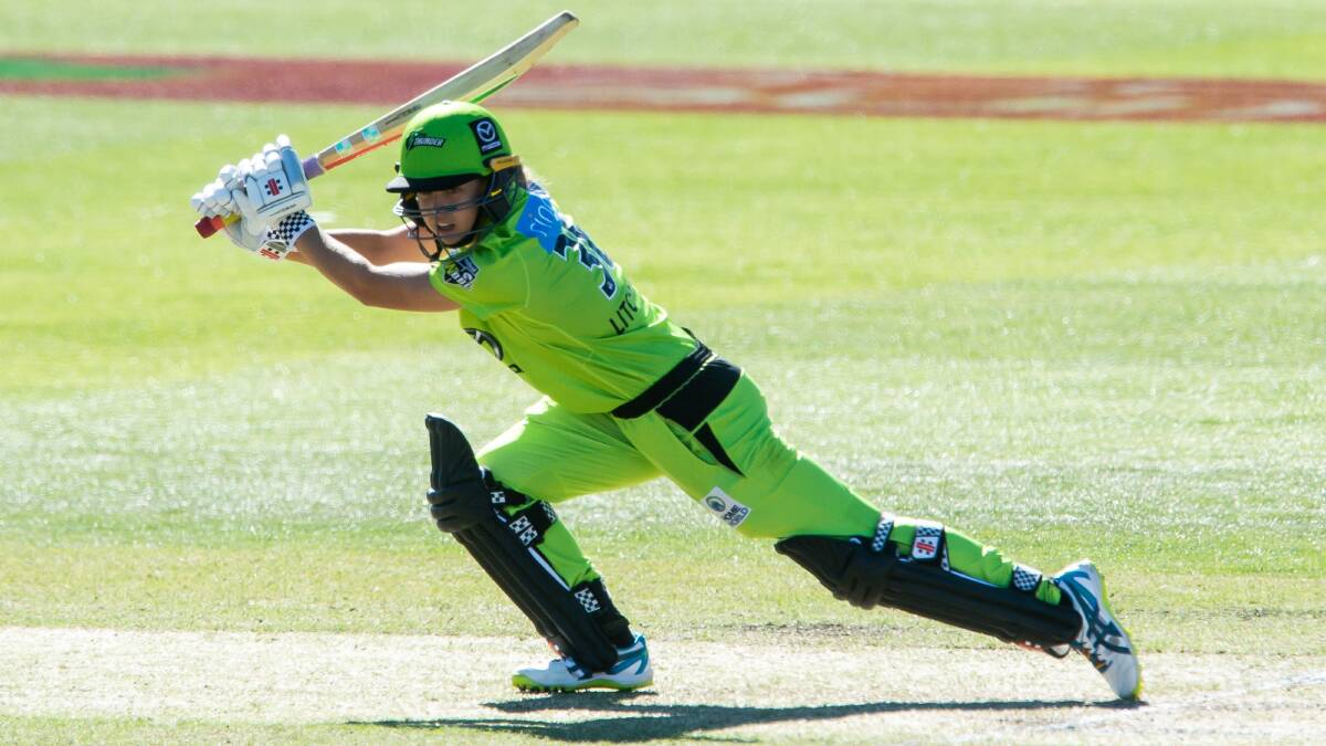 RECORD BREAKER: Phoebe Litchfield hits out in her record-breaking, match-winning half century on Sunday afternoon. Photo: IAN BIRD/SYDNEY THUNDER