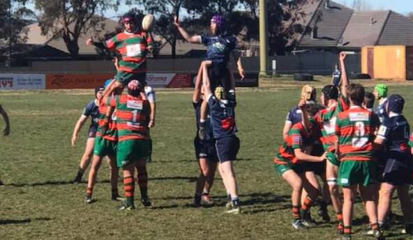 FLYING HIGH: Orange City's under 17s win a lineout against Forbes on Saturday morning. Photo: CONTRIBUTED