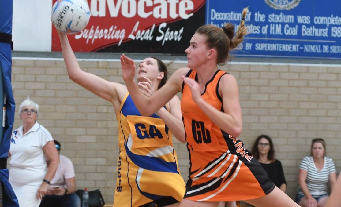HEADLINER: Alex Emerson (right) is one of eight incumbents that return to Orange's side for a tilt at the 2019 Netball NSW Under-17 State Championship. Photo: CHRIS SEABROOK