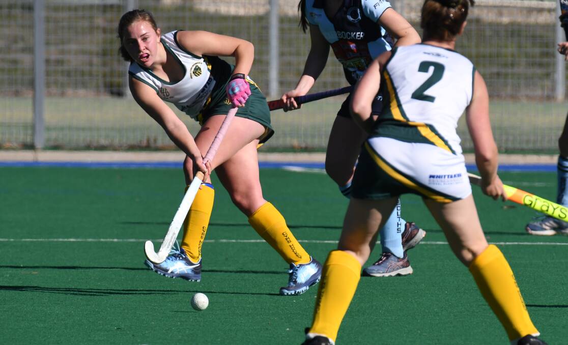 All the action from Saturday's clash at Orange Hockey Centre, photos by JUDE KEOGH