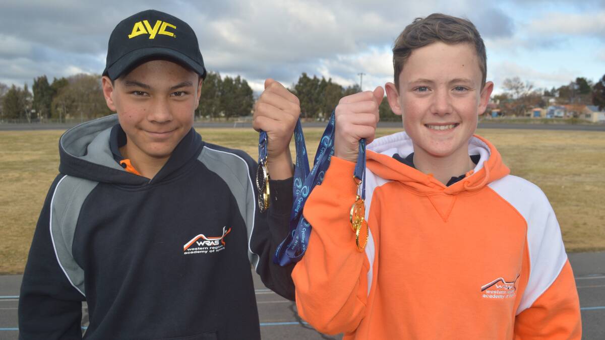 WHEELING AND DEALING: Orange's Ben Anderson and Luke Tuckwell show off the medals they've won recently. They've both earned selection in NSW's under-15 team as well. Photo: MATT FINDLAY