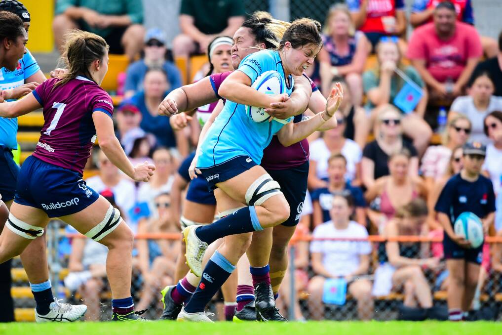 COMING HOME: Panuara's Grace Hamilton carries for the Waratahs in their win over Queensland, she'll play in front of a home crowd on Saturday. Photo: RUGBY AU/STU WALMSLEY