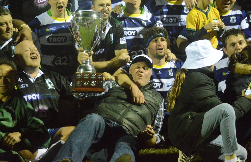 BACK-TO-BACK: Jason Robertson celebrates Knox Old Boys Legends' second consecutive Lachlan Robertson Memorial Cup win over Emus Legends. Photo: MATT FINDLAY