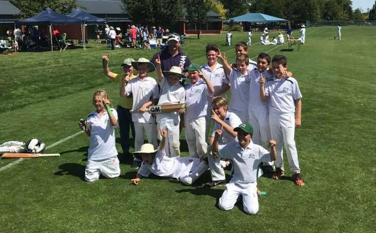 CHAMPIONS: The Orange City Bradmans celebrate their unlikely under-12 Orange District Cricket Association grand final victory. It was one of two titles the club claimed. Photo: CONTRIBUTED