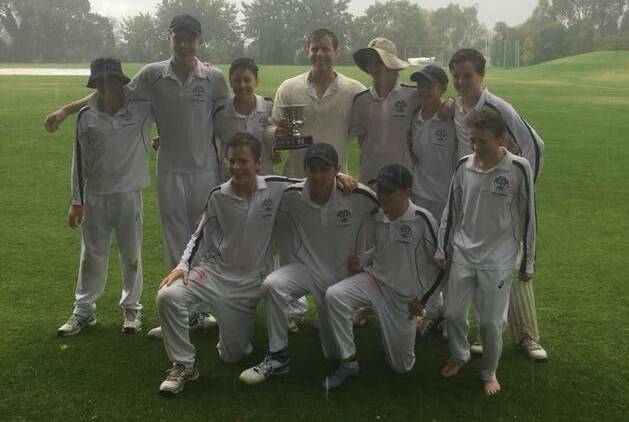 BLESS THE RAINS: Not even the rain could wash the smiles from the Kinross players' faces as they celebrated their Centenary Cup title on Saturday afternoon. Photo: CONTRIBUTED
