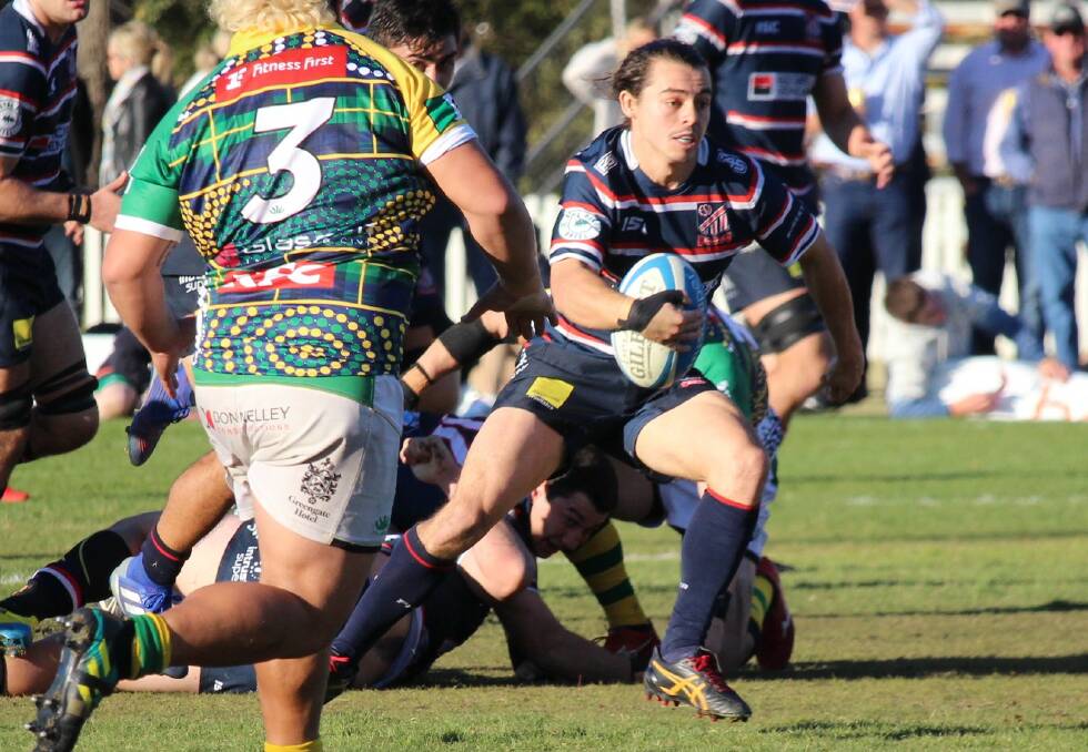 TOP OPPORTUNITY: Orange's Jack Grant, pictured finding space for Eastern Suburbs at Wade Park, has linked with Japanese Top League franchise NTT Docomo Red Hurricanes. Photo: JUDE KEOGH