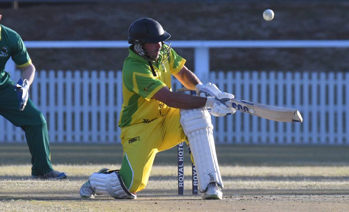GOLDEN BAT: CYMS' Mick Delaney scoops over fine leg during his stunning ton against Centenials. Photo: JUDE KEOGH