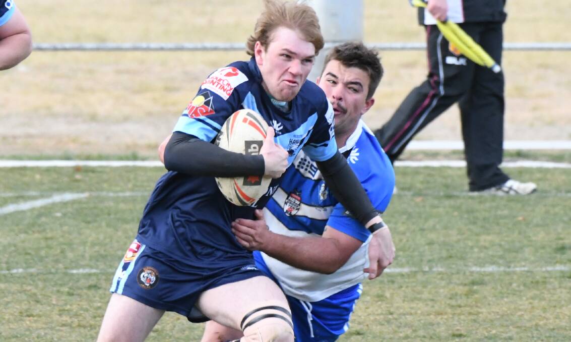 MINOR DREAMS: Hawks' Jordan Baker finds space in his side's 40-point demolition of Bathurst St Pat's on Sunday afternoon. Photo: CHRIS SEABROOK