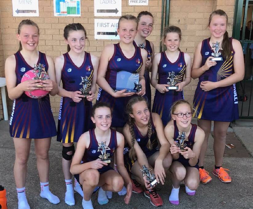 ONE DOWN, ONE TO GO: Catherine McAuley celebrates its NSW Catholic Primary Schools championship on Tuesday afternoon. Photo: CONTRIBUTED