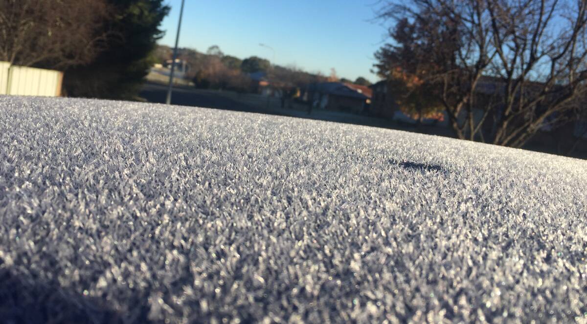 ICE, ICE BABY: There was a heavy frost on Monday morning to mark the final day of autumn, enough to cover lawns and cars with ice. Photo: NICK McGRATH