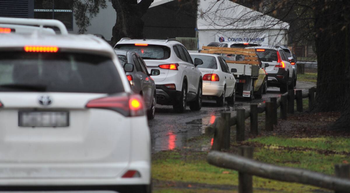 WAITING GAME: The queue at Orange's Wade Park testing site stretched all the way to Moulder Street on Thursday morning. Photo: JUDE KEOGH