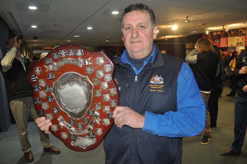 TOP GONG: Dave Oates shows off the sportsperson of the year shield after winning it for a second time. Photo: NICK McGRATH 0803nmawards3