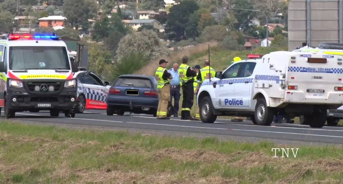 DISTRIBUTOR CRASH: Emergency services respond to an accident on the Northern Distributor Road. Photo: TOP NOTCH VIDEO/TROY PEARSON