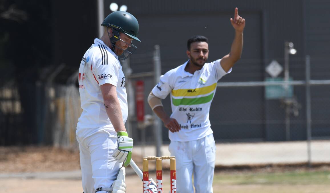 THE BIG MOMENT: A disappointed Brenton Anthony reacts to his dismissal as CYMS' Aquinder Dhillion celebrates, the wicket brought an end to Centrals' hopes of a victory. Photo: JUDE KEOGH