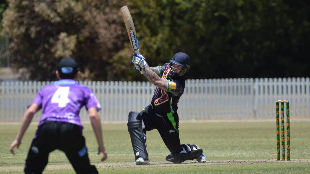 GOING BIG: Sydney Thunder star Lachlan O'Connor goes aerial in his match-turning, game-two half century on Thursday morning. Photo: MATT FINDLAY