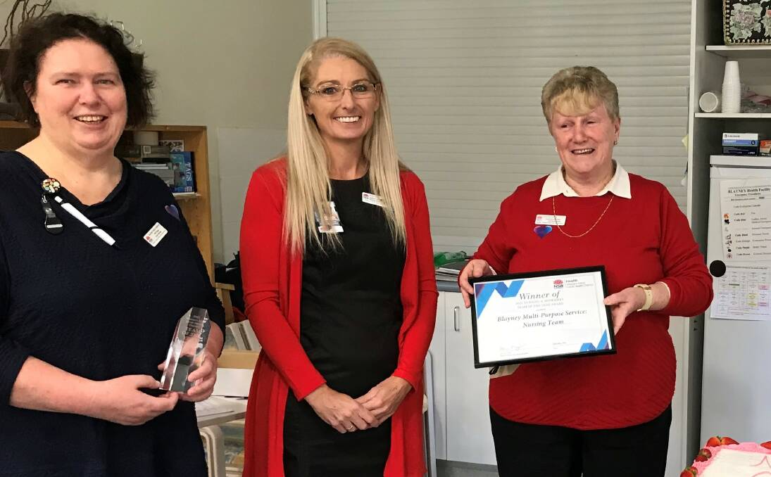 AWARD WINNERS: Blayney's Deb Higgs and Kathy Hillier with Western NSW LHD's Jackie Corliss (middle), receiving the Nursing/Midwifery Team of the Year award. Photo: WESTERN NSW LHD