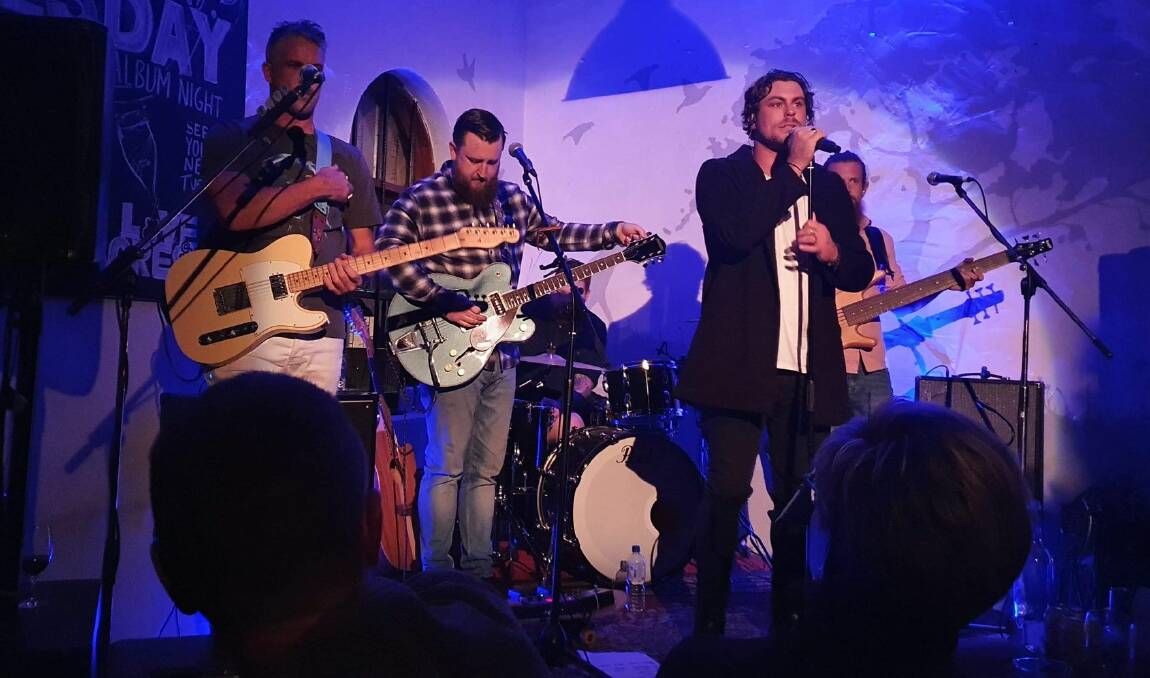 SUPPORT: Robbie Mortimer and his band play The Agrestic Grocer's Ruby Tuesday recently, with government funding to support the continued events.Photo: CONTRIBUTED