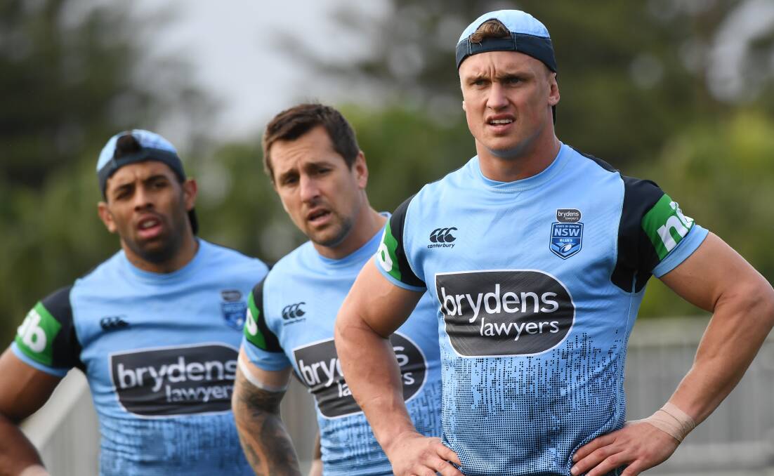 KANGAROOS CHANCE: Jack Wighton (right) is hopeful a big performance in Wednesday's State of Origin decider could press his claims for an Australian jersey. Photo: AAP/DEAN LEWIS