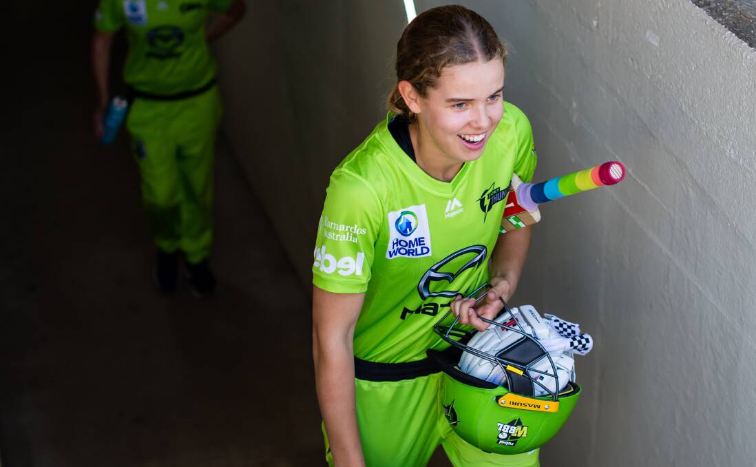 ALL SMILES: Phoebe Litchfield comes back into the sheds after leading the Thunder to a stunning victory on Sunday. Photo: IAN BIRD/SYDNEY THUNDER