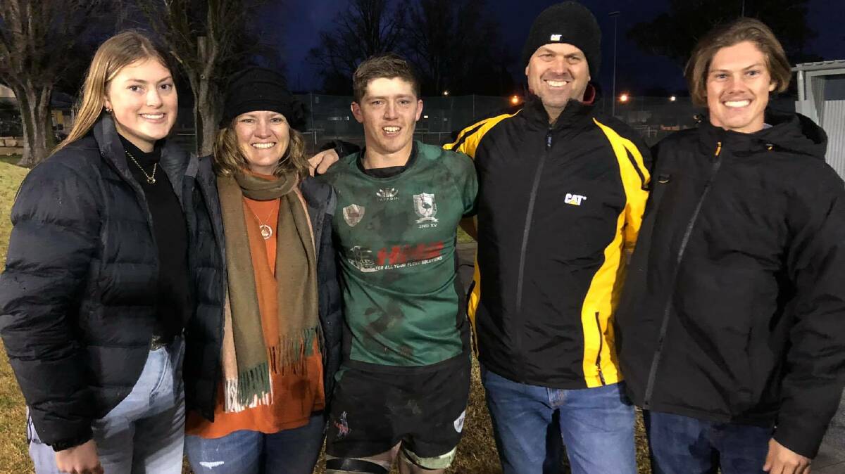 EMOTIONAL: Fletcher Wright (centre) flanked by his family Mackenzie, Danielle, Ben and Cooper after his return to the rugby union field on Saturday. Photo: DANIELLE WRIGHT