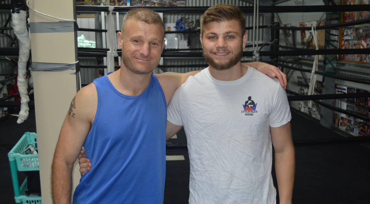 FATHER-SON DUO: Dave and Jack Littlefield take a break from training leading into the latter's first fight in Orange as a professional on Saturday. Photo: MATT FINDLAY