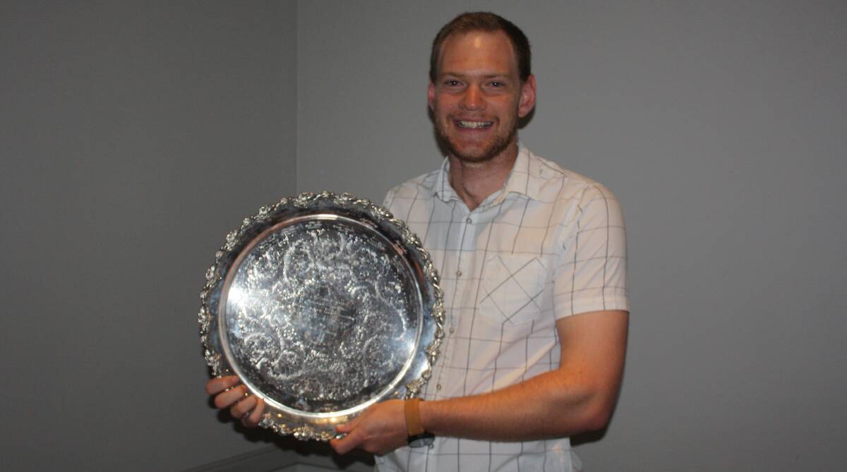 THE REAL MVP: Cavaliers skipper Matt Corben proudly displays his new prize, the Orange District Cricket Association player-of-the-year plate. Photo: PETE JARICK