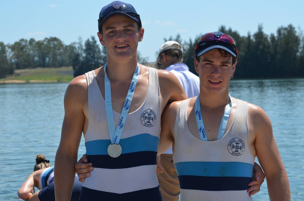 SILVER LINING: Tim Mutton and James Moon celebrate their silver medal at the state titles. Photo: CONTRIBUTED