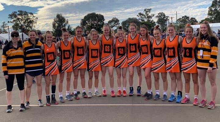 THRILLED: Orange's under 15s and their coaches in Sydney, following the side's excellent fifth finish. Photo: SUPPLIED.