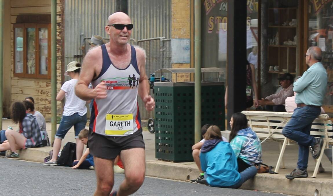RUNNING HOT: Gareth Thomas completes the Carcoar Cup's 10km race, he ended up finishing second in the NSW Regional Distance Running Championships' 50-59 years age group.