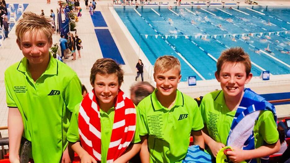 TOP 10: Jets' boys' 12 years 4x50m freestyle relay team picked up a finalist ribbon last weekend. Photo: JETS SWIM CLUB