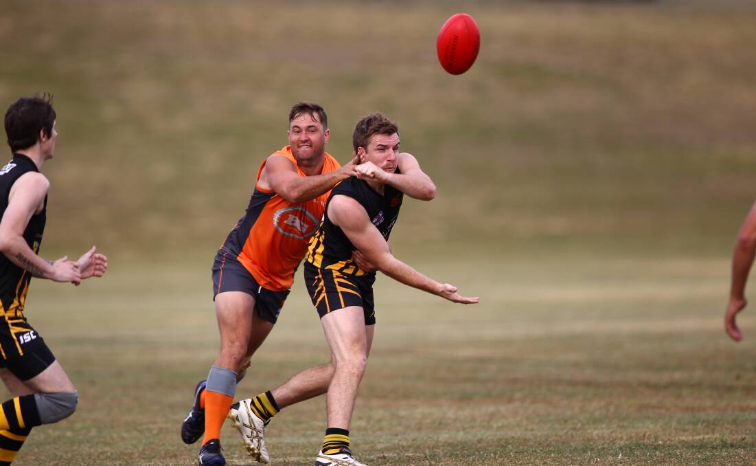 MIDFIELD MANAGER: Mitch McKenna's efficient use of the footy in the midfield will be key for Orange on Saturday. Photo: PHIL BLATCH