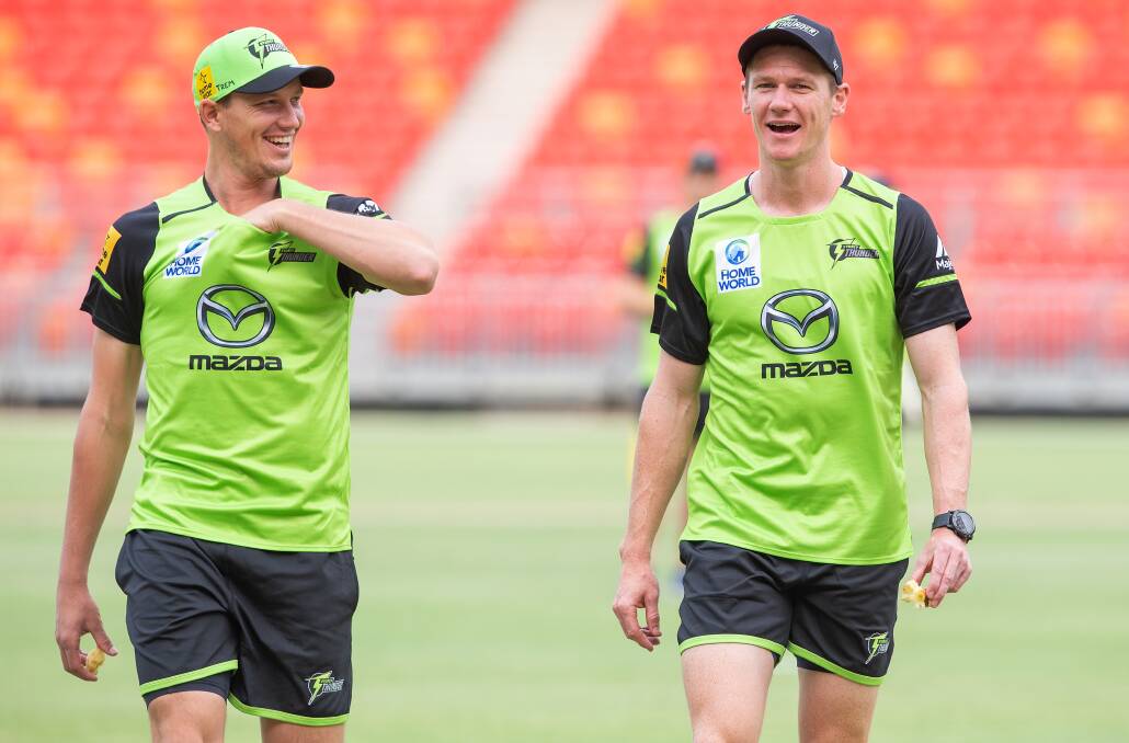 WINNING FEELING: Sydney Thunder quicks Chris Tremain and Brendan Doggett at training, their side is unbeaten and plays their first home game on Saturday. Photo: SYDNEY THUNDER