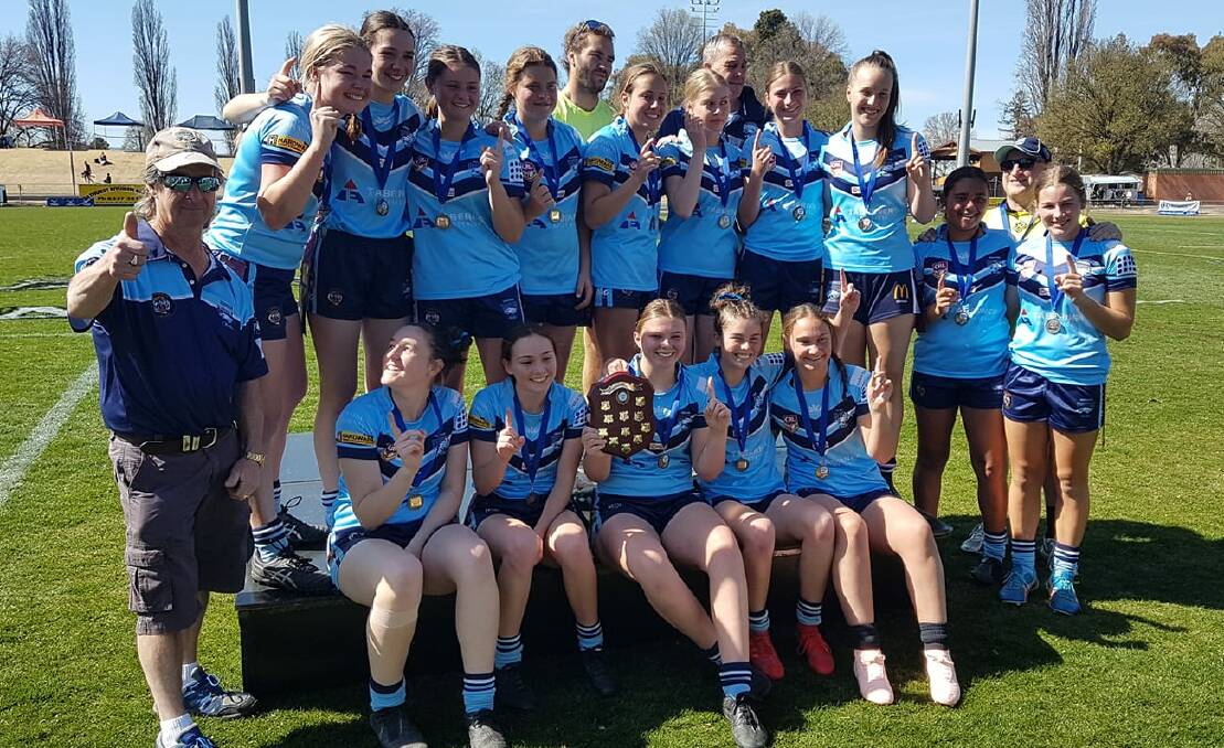 BACK-TO-BACK: Orange Hawks celebrate their second consecutive under-18 league tag premiership on Sunday morning at Carrington Park. Photo: WESTERN RAMS