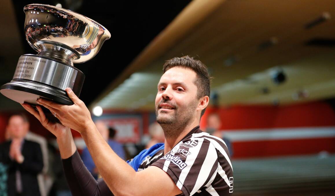 IN THE MIX: Jason Belmonte hoists this year's Tournament of Champions trophy, which was his 10th Major. Photo: PBA MEDIA
