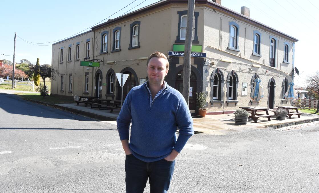 NEW ERA: Ben Cochrane outside the Railway Hotel in Millthorpe, he and his family officially took over ownership on Monday. Photo: MARK LOGAN