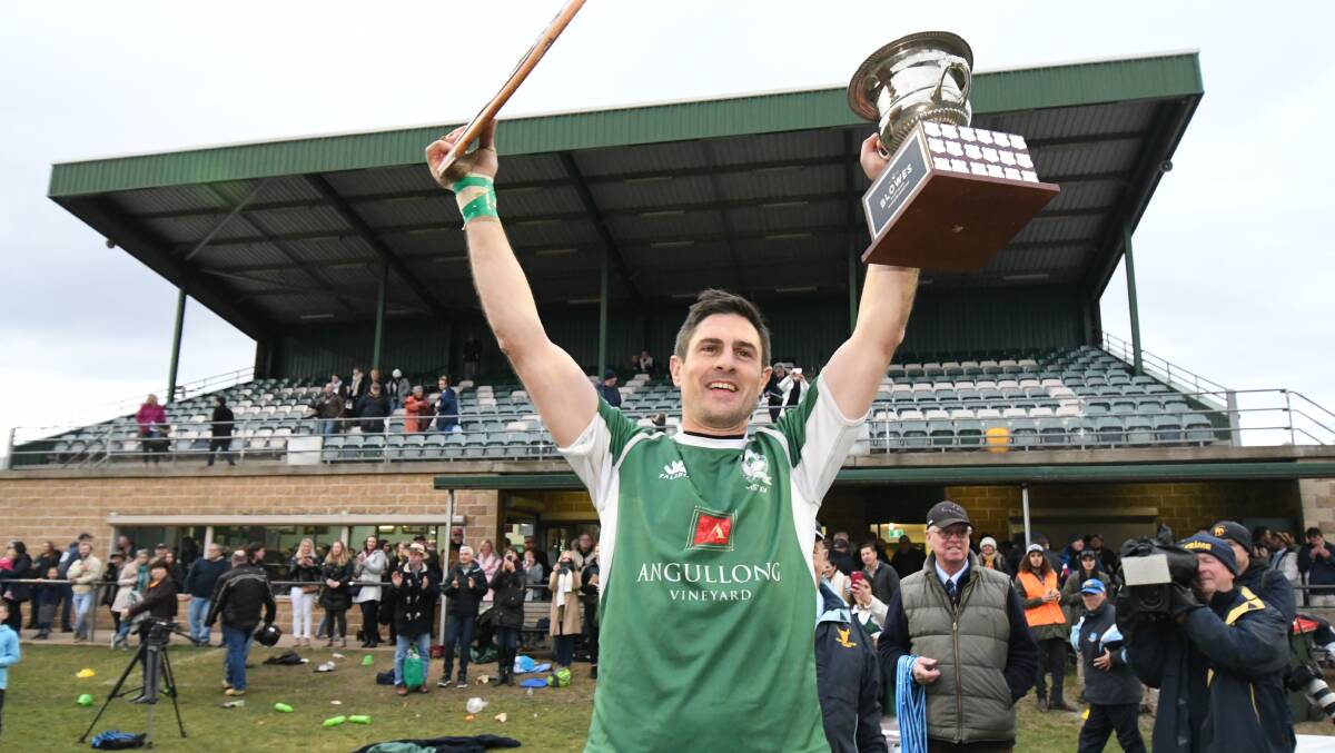 CHAMPION AGAIN: Nigel Staniforth lifts the Blowes Clothing Cup for a third time as skipper, the three titles matching his Shute Shield wins. Photo: JUDE KEOGH