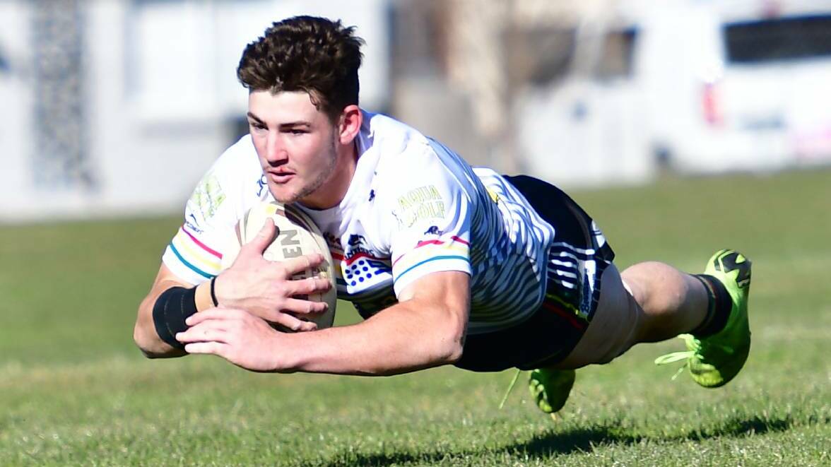 TRY TIME: Mackenzie Atkins dives over to score against Blayney earlier this season. Photo: ALEXANDER GRANT
