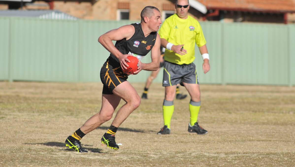 TITLE SHOT: Dubbo coach Will Bunt has tipped Simon Kay (pictured) and his Orange Tigers to go on to win the 2017 Central West AFL flag. Photo: JUDE KEOGH
