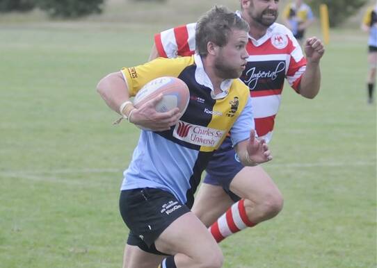 CENTRE OF ATTENTION: Lachie Blunt, pictured running riot for CSU Bathurst in 2012, has linked with the Lions and will add plenty of starch to their backline. Photo: WESTERN ADVOCATE