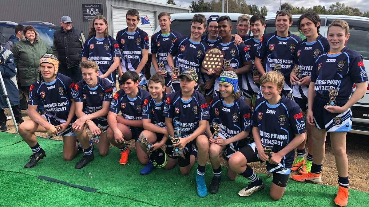 INCREDIBLE YEAR: Bloomfield's under 14s celebrate their undefeated premiership victory. Photo: GROUP 10 JUNIOR RUGBY LEAGUE