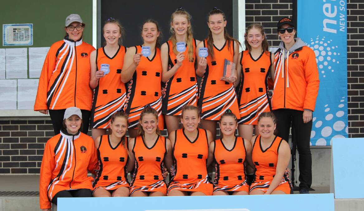 TIED ON TOP: Orange celebrates finishing equal first - second on a countback - at last weekend's under-15, division two State Age Championship. Photo: NETBALL NSW