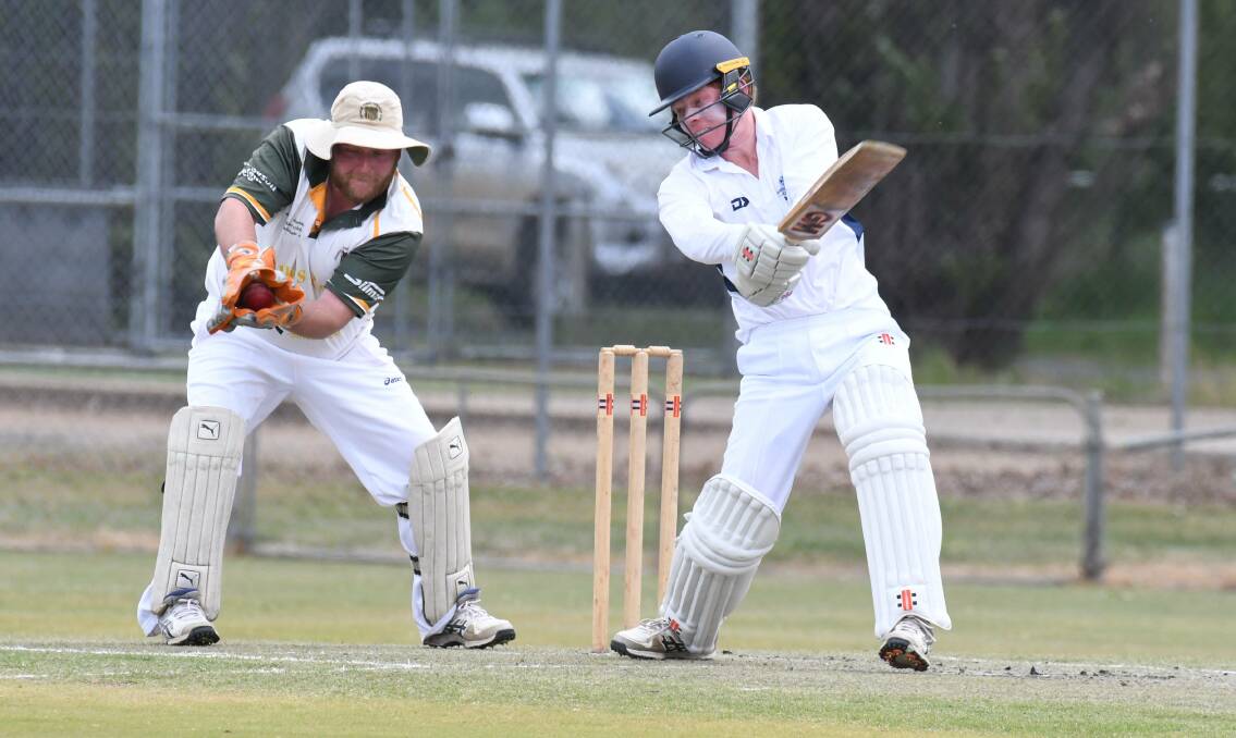 GOOD GLOVES: CYMS wicketkeeper Adam Smith takes one cleanly on Saturday, his green and golds are in a dominant position. Photo: CARLA FREEDMAN