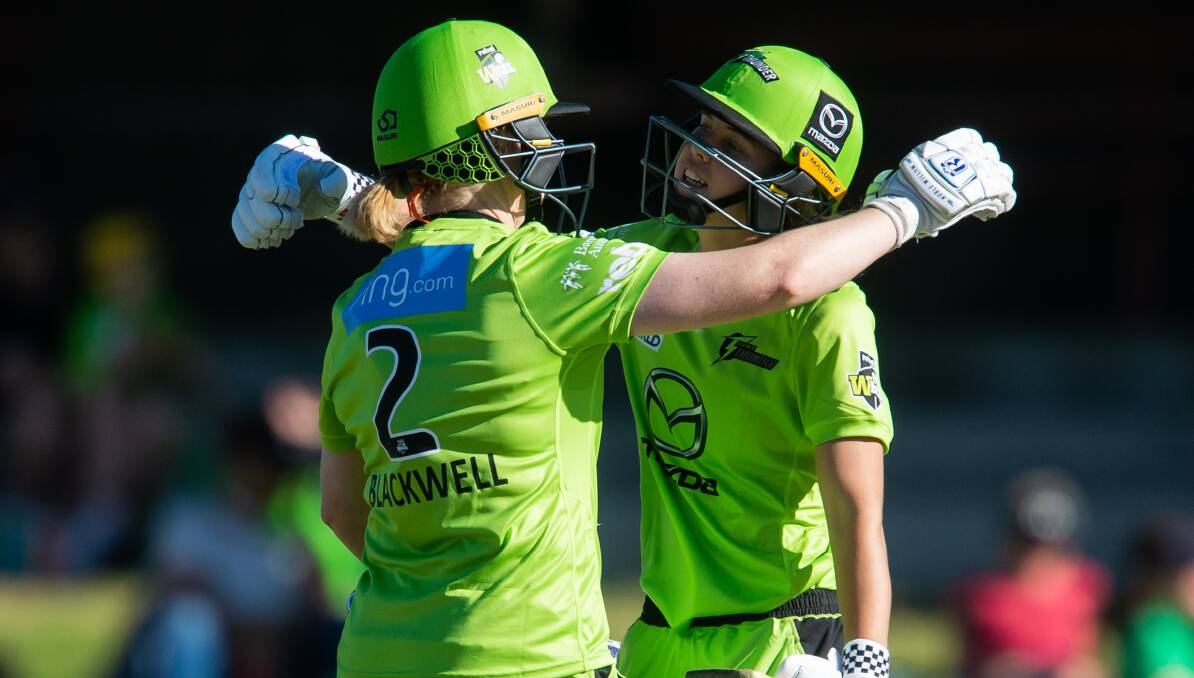 THEN TO NOW: Alex Blackwell embraces Phoebe Litchfield during the season, the former's career is now over while the latter's is just beginning. Photo: IAN BIRD/SYDNEY THUNDER