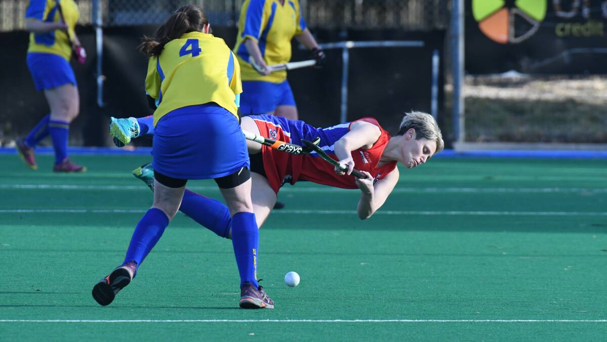 All the action from Saturday's local derby at Orange Hockey Centre, photos by JUDE KEOGH