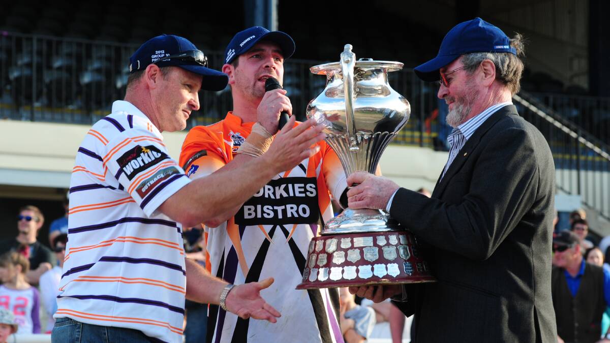SURPRISE: Lithgow's Jono Van Veen accepts the premiership trophy in 2012, but his side still missed the finals when the last decade as a whole was considered. 