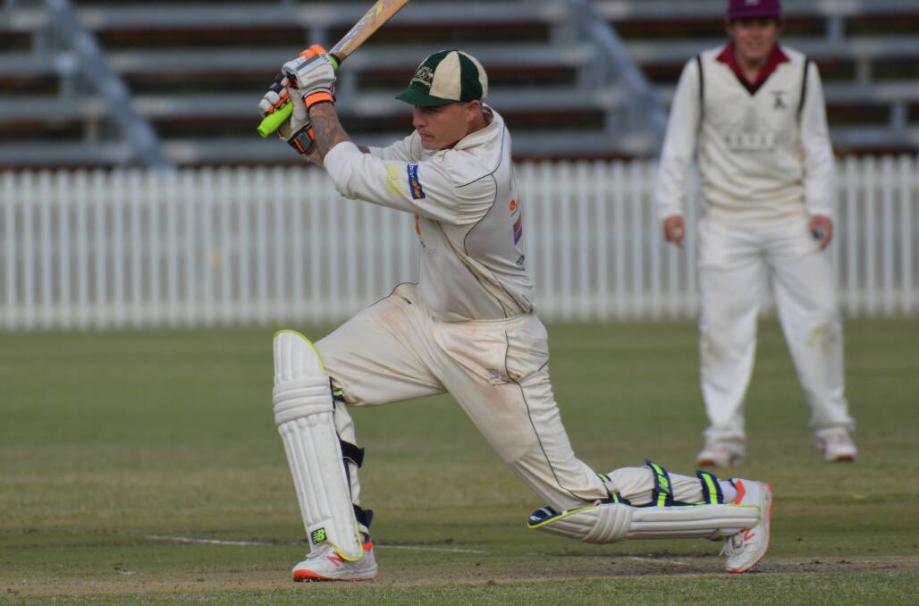 INSPIRATIONAL: Ed Morrish hits out during his defiant, match-winning rearguard innings in the 2018-19 grand final. Photo: MATT FINDLAY
