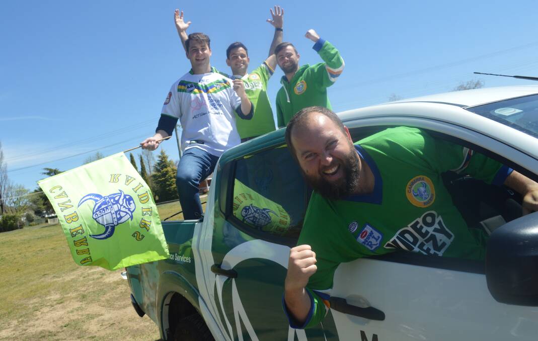 DECIDER BOUND: Die-hard Canberra fans Drew Bale (front) and Jamil Khalfan (back, middle) are quite happy to drive the Raiders' bandwagon, which includes Harry Cummins and Phil Johnson. Photo: MATT FINDLAY