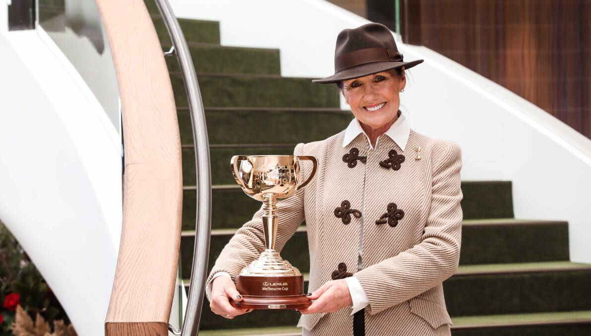 REGIONAL FOCUS: Victorian Racing Club chair Amanda Elliott shows off the Melbourne Cup at Tuesday's launch, the fabled trophy will visit Yeoval this year. Photo: VRC