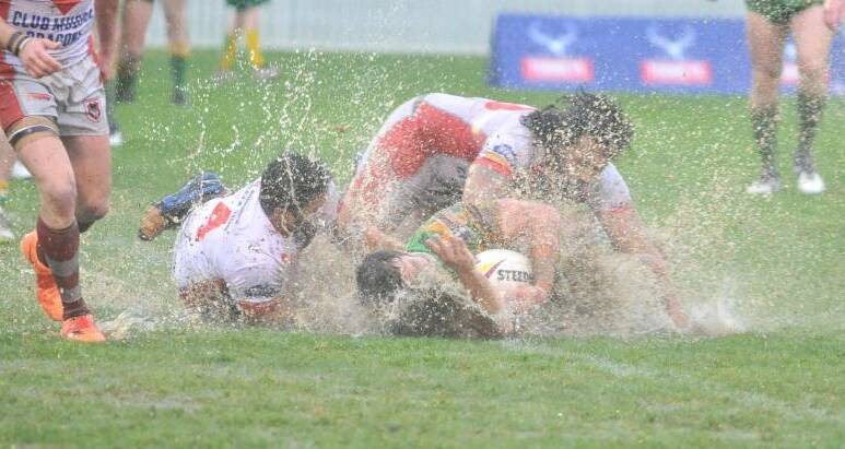 WET'N'WILD: The Mudgee Dragons' sole premiership in this decade came on the most abominable of days at Orange's Wade Park, where they beat CYMS. 